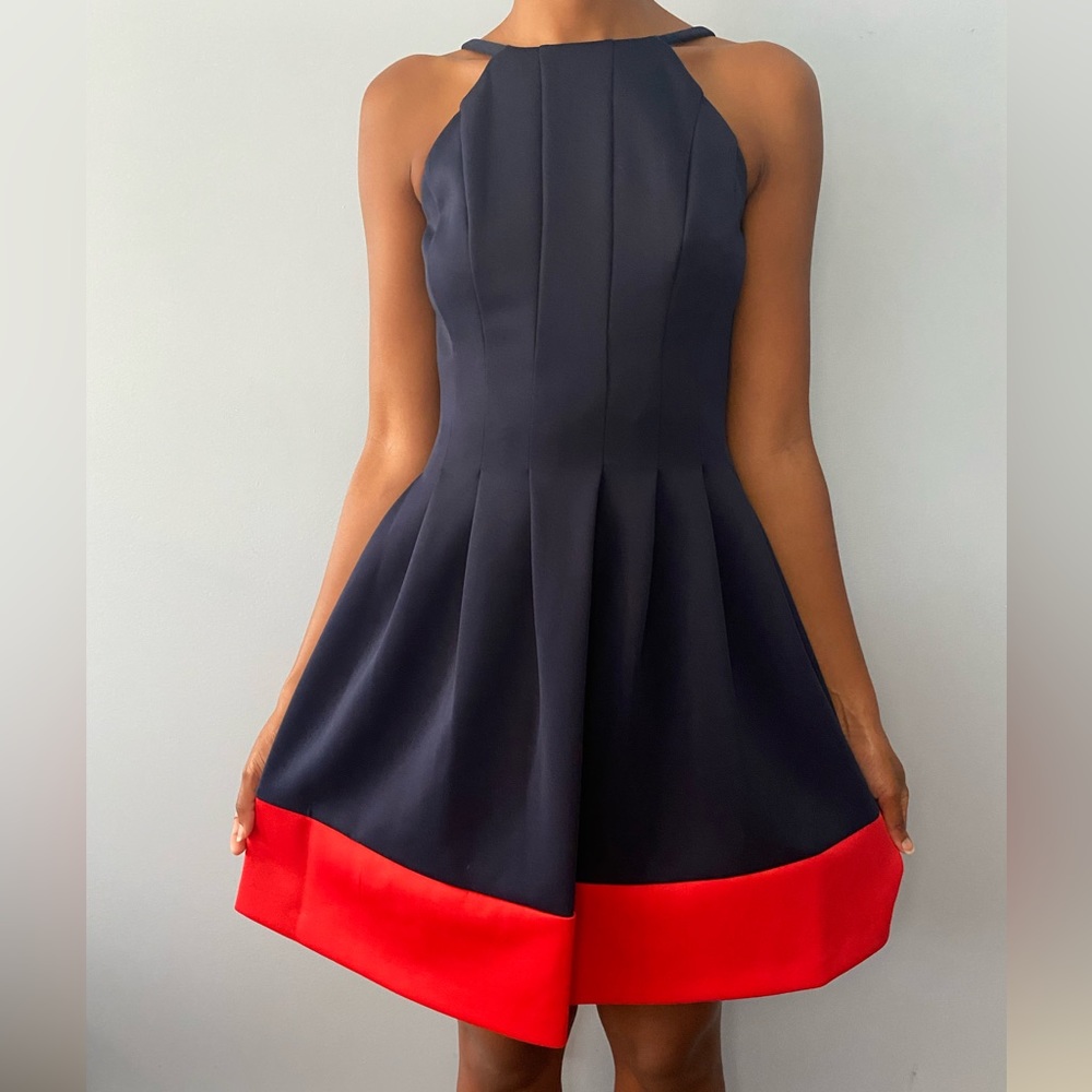 Navy blue and red A line Vince Camuto fit and flare dress with boat neckline
